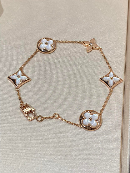 [Panda Jewelry]STAR AND SUN 5 MOTIF MOP PINK GOLD BRACELET