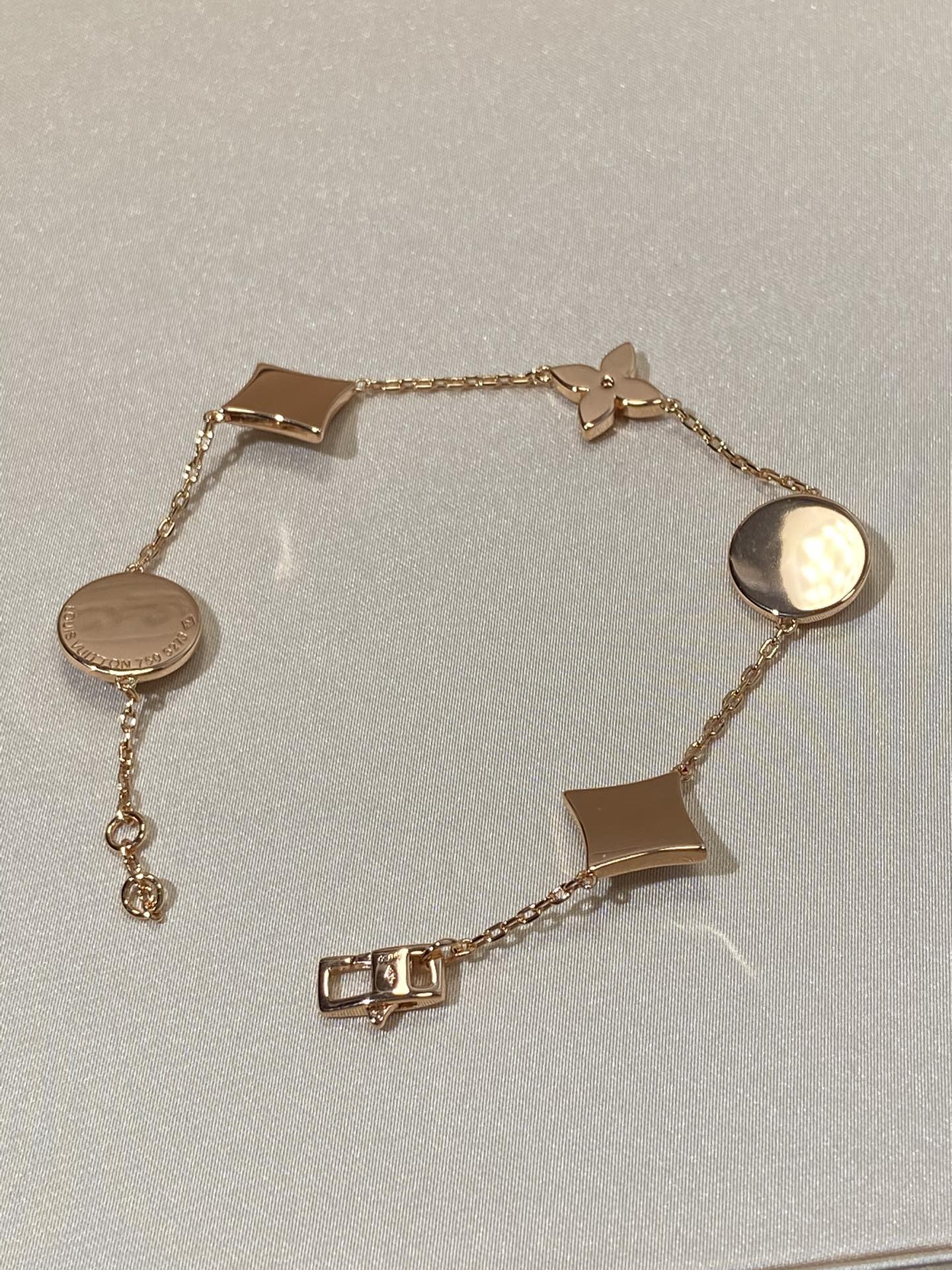 [Panda Jewelry]STAR AND SUN 5 MOTIF MOP PINK GOLD BRACELET