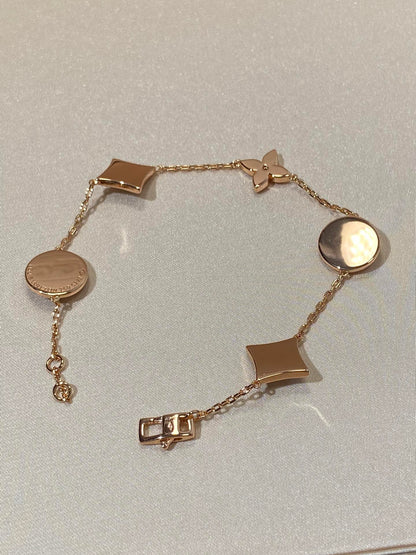 [Panda Jewelry]STAR AND SUN 5 MOTIF MOP PINK GOLD BRACELET