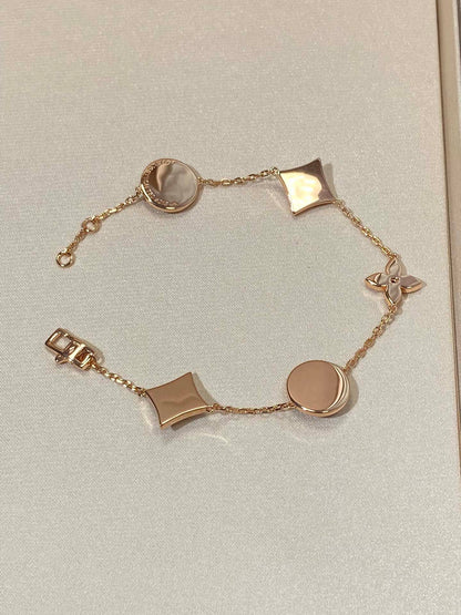 [Panda Jewelry]STAR AND SUN 5 MOTIF MOP PINK GOLD BRACELET