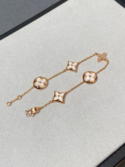 [Panda Jewelry]STAR AND SUN 5 MOTIF MOP PINK GOLD BRACELET