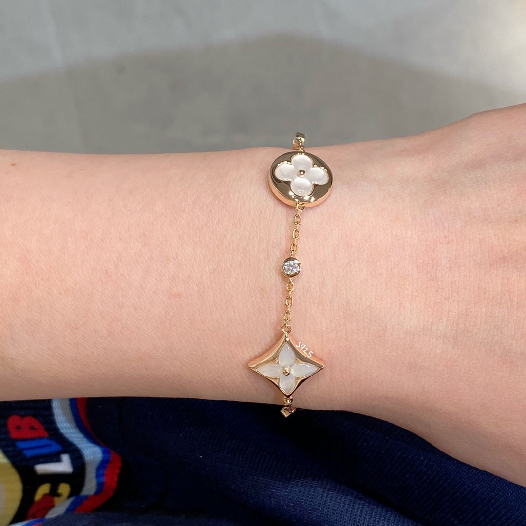 [Panda Jewelry]STAR AND SUN 4 MOTIF WHITE MOP PINK GOLD BRACELET