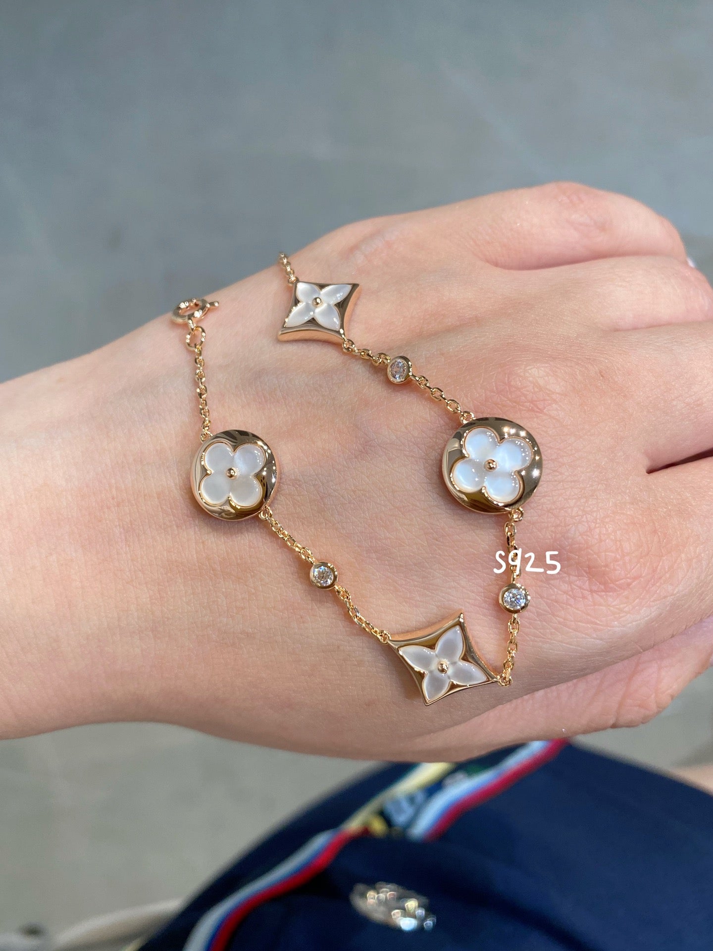 [Panda Jewelry]STAR AND SUN 4 MOTIF WHITE MOP PINK GOLD BRACELET