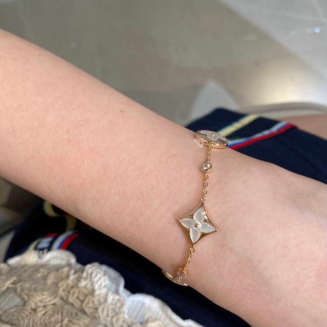 [Panda Jewelry]STAR AND SUN 4 MOTIF WHITE MOP PINK GOLD BRACELET