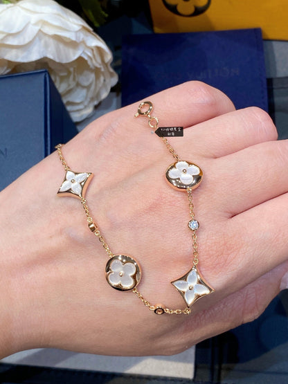 [Panda Jewelry]STAR AND SUN 4 MOTIF WHITE MOP PINK GOLD BRACELET